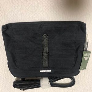 Roots cross body bag